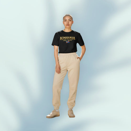 K&ChildrenBusiness black t-shirt with gold text 'KINSHASA La Capital' and the flag of the Democratic Republic of Congo.