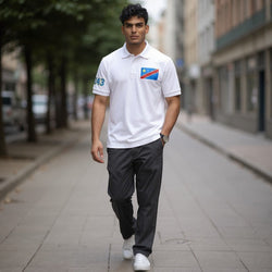 K&ChildrenBusiness white 100% polyester polo shirt with DRC flag on chest and 243 on sleeve.